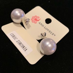 Pair of double sided pearl earrings with gem